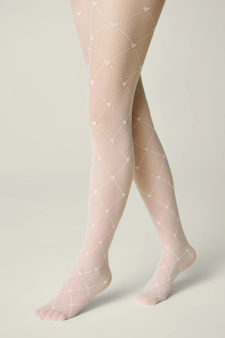 Sheer tights with a subtle pattern on a neutral background #color_bianco