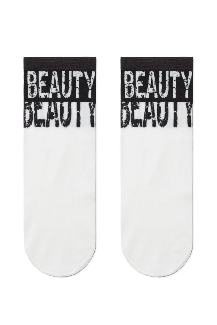 White socks with 'BEAUTY' text on a white background