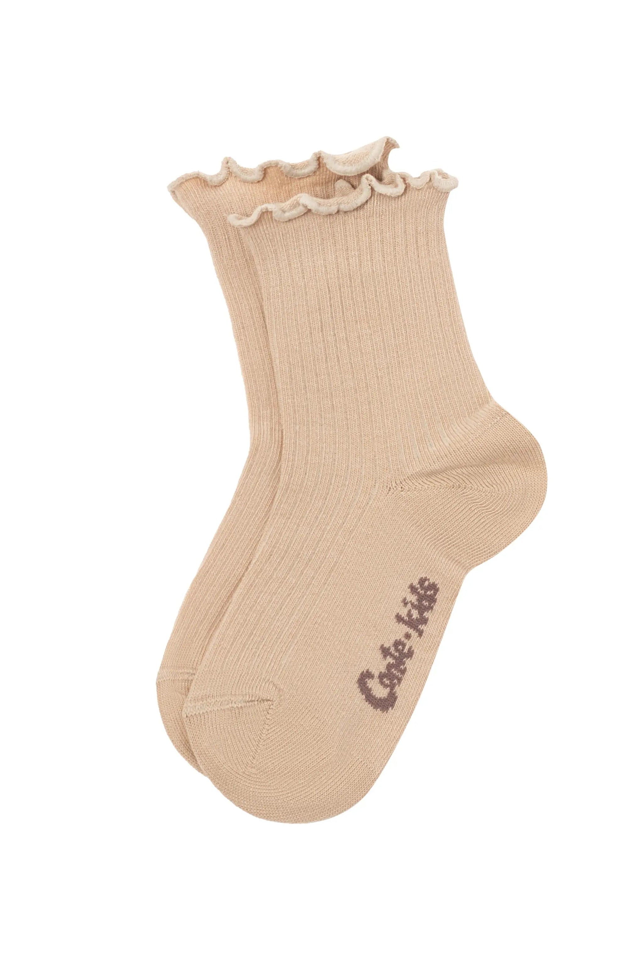 Beige sock with ruffled top on a white background #color_beige