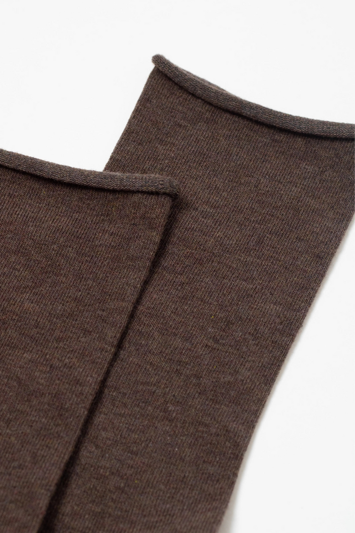 Brown fabric with a visible seam on a white background #color_brown