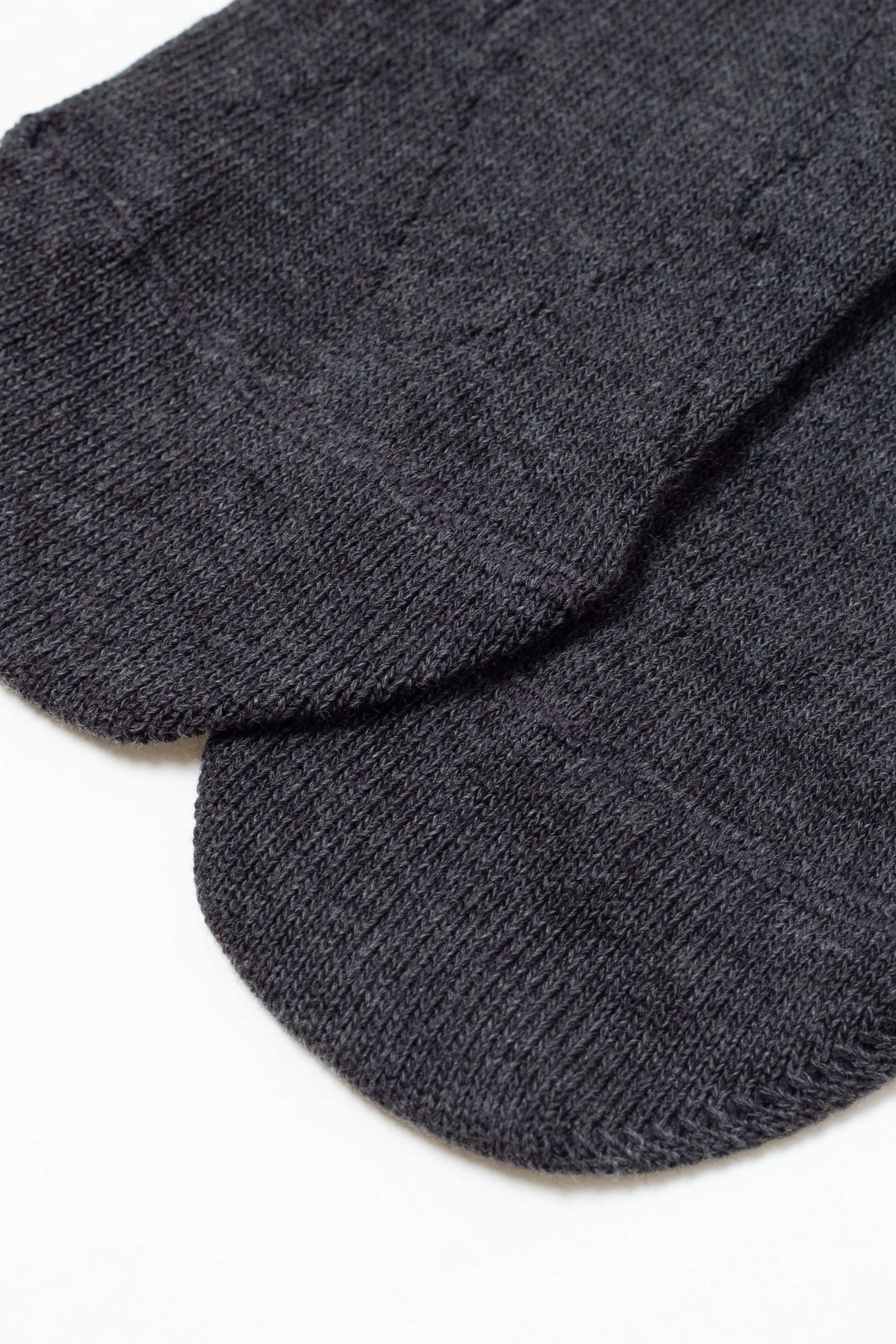 Two dark gray socks on a white background #color_dark-gray