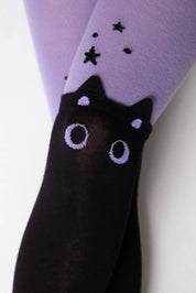 Black cat-themed tights with purple accents on a white background