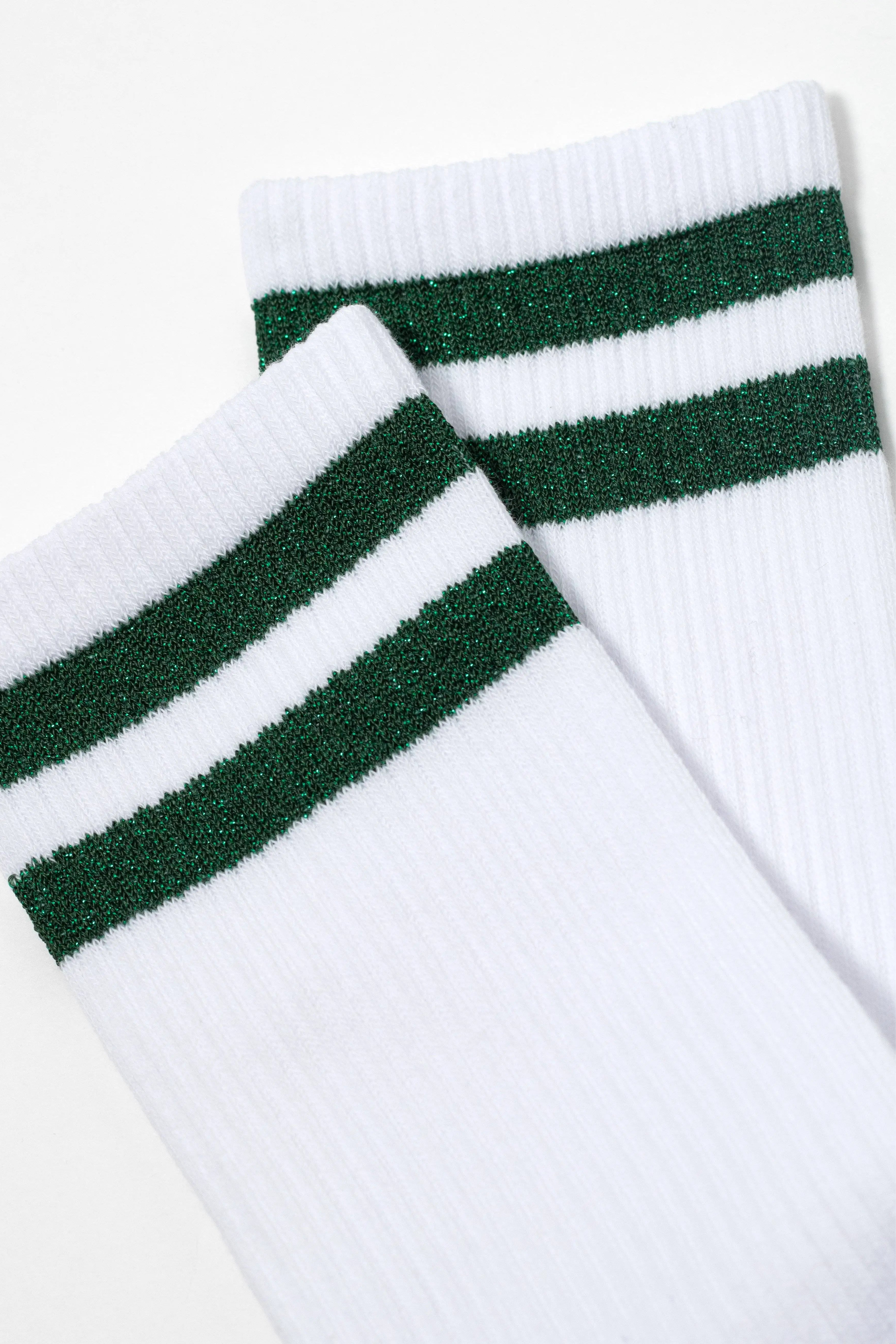 White socks with green stripes on a white background #color_green