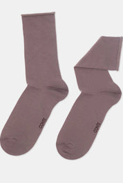 Pair of brown socks on a white background  #color_cocoa