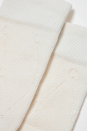 Close-up of white textured fabric #color_milk
