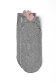 A pair of heather gray ankle socks with a pink heart-shaped cuff detail and the brand name 'COATE' printed vertically on the sole, shown on a plain white background.