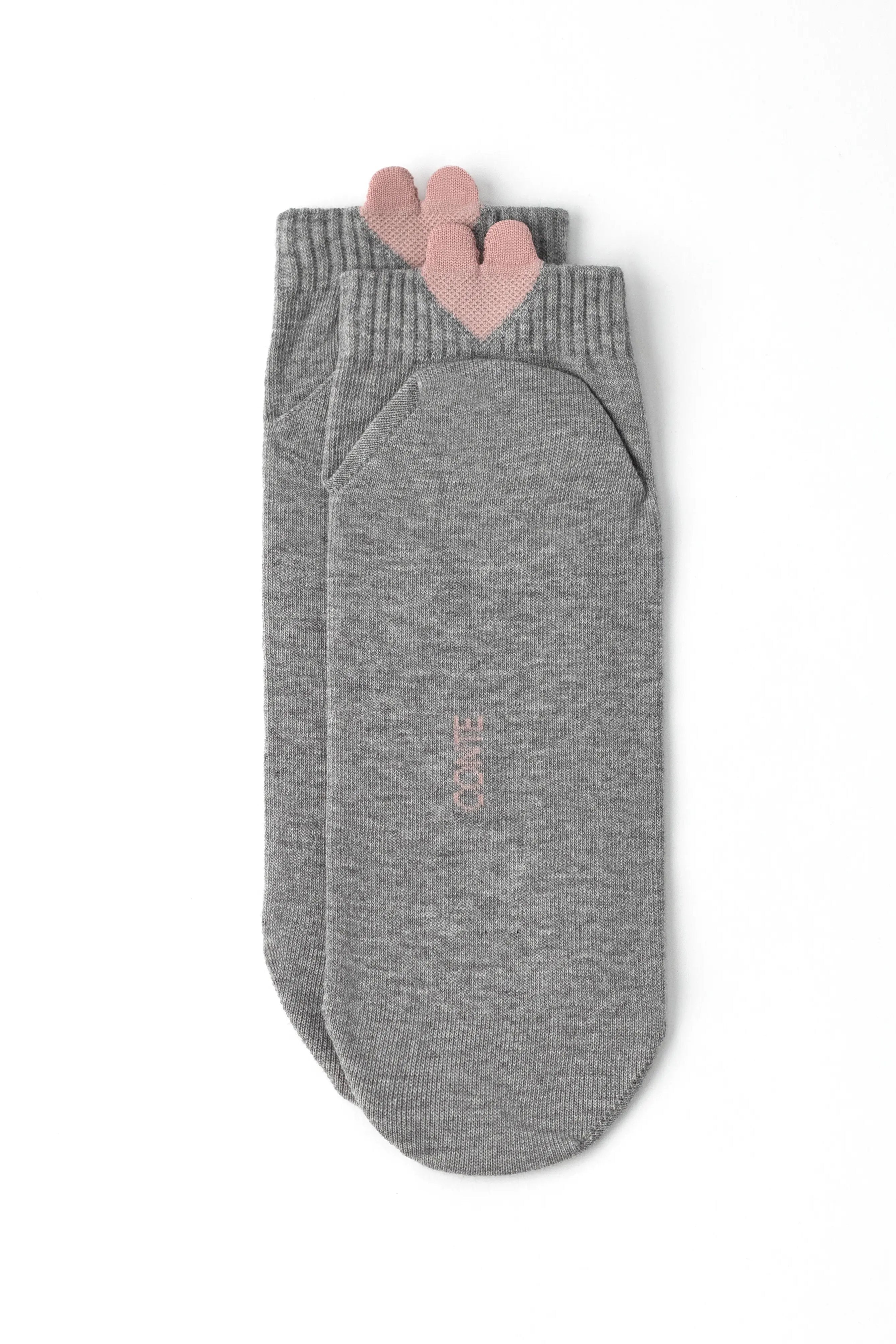 A pair of heather gray ankle socks with a pink heart-shaped cuff detail and the brand name 'COATE' printed vertically on the sole, shown on a plain white background.