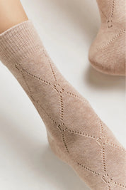 Beige sock on a white background #color_beige