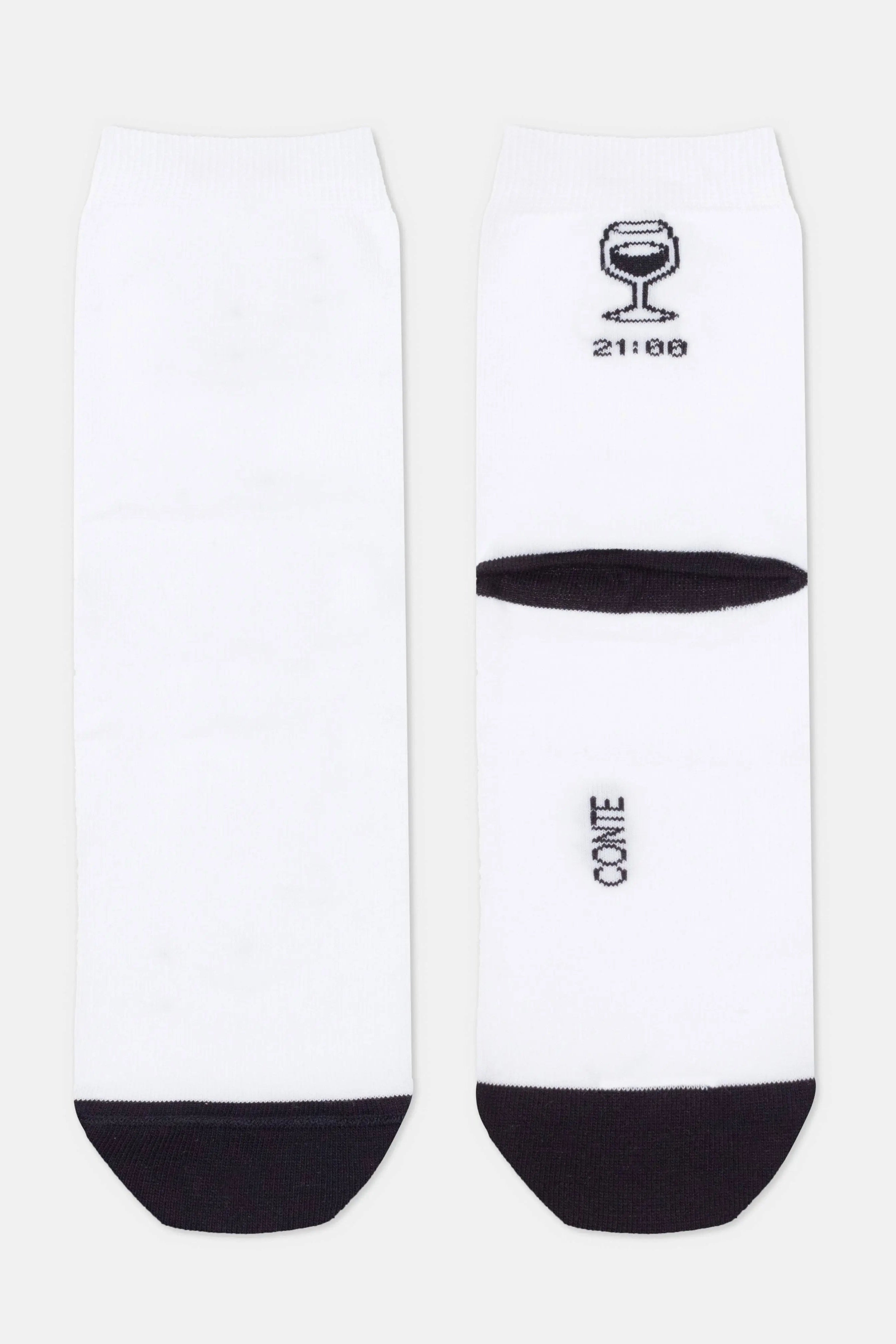 White socks with black accents and branding on a white background