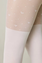 Beige tights with white heart pattern on a light background #color_bianco