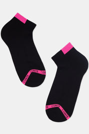 Black socks with pink accents on a white background #color_black