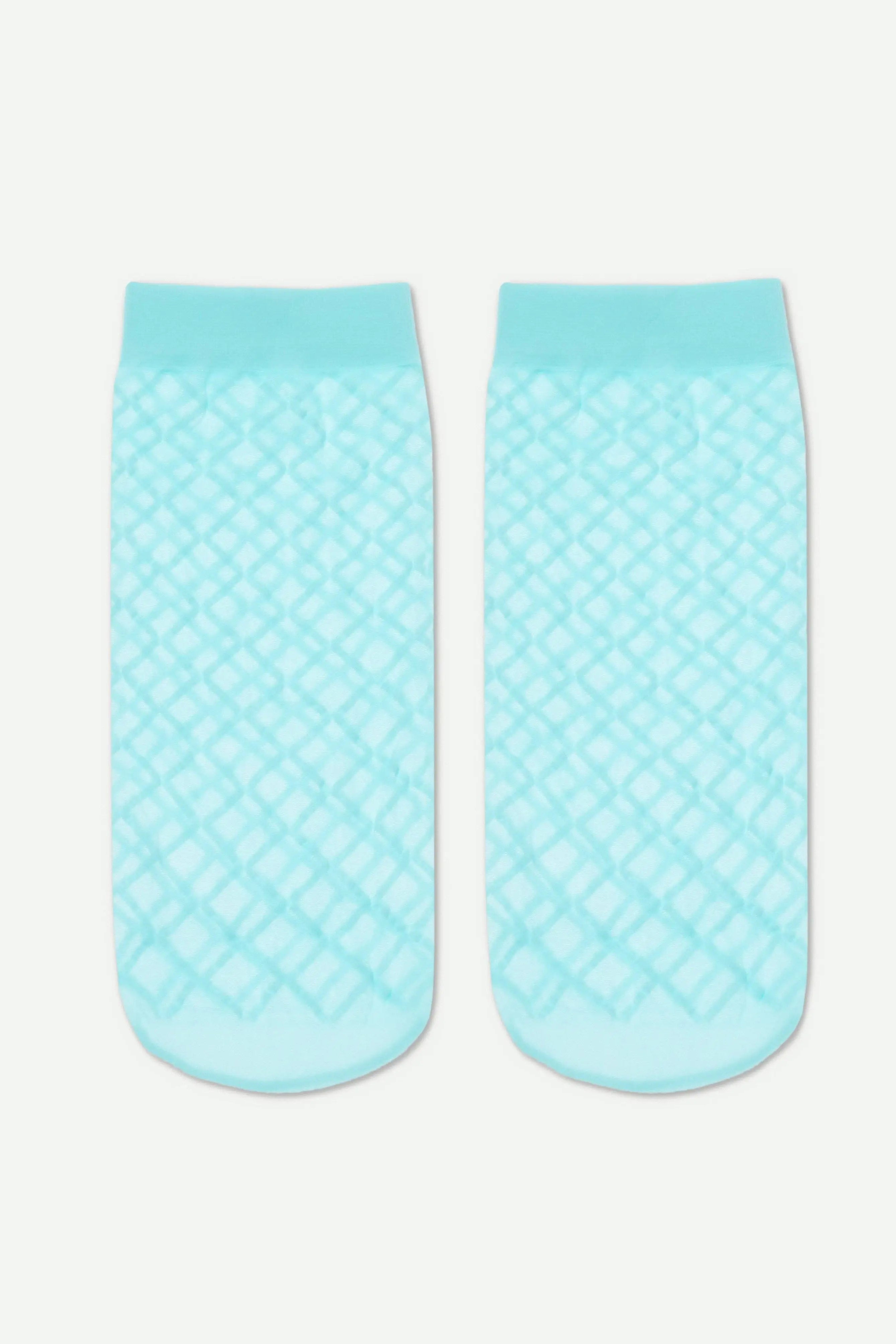 Pair of light blue textured socks on a white background #color_turquoise
