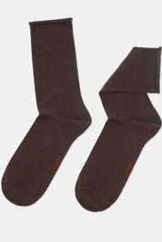 Pair of brown socks on a light gray background #color_brown