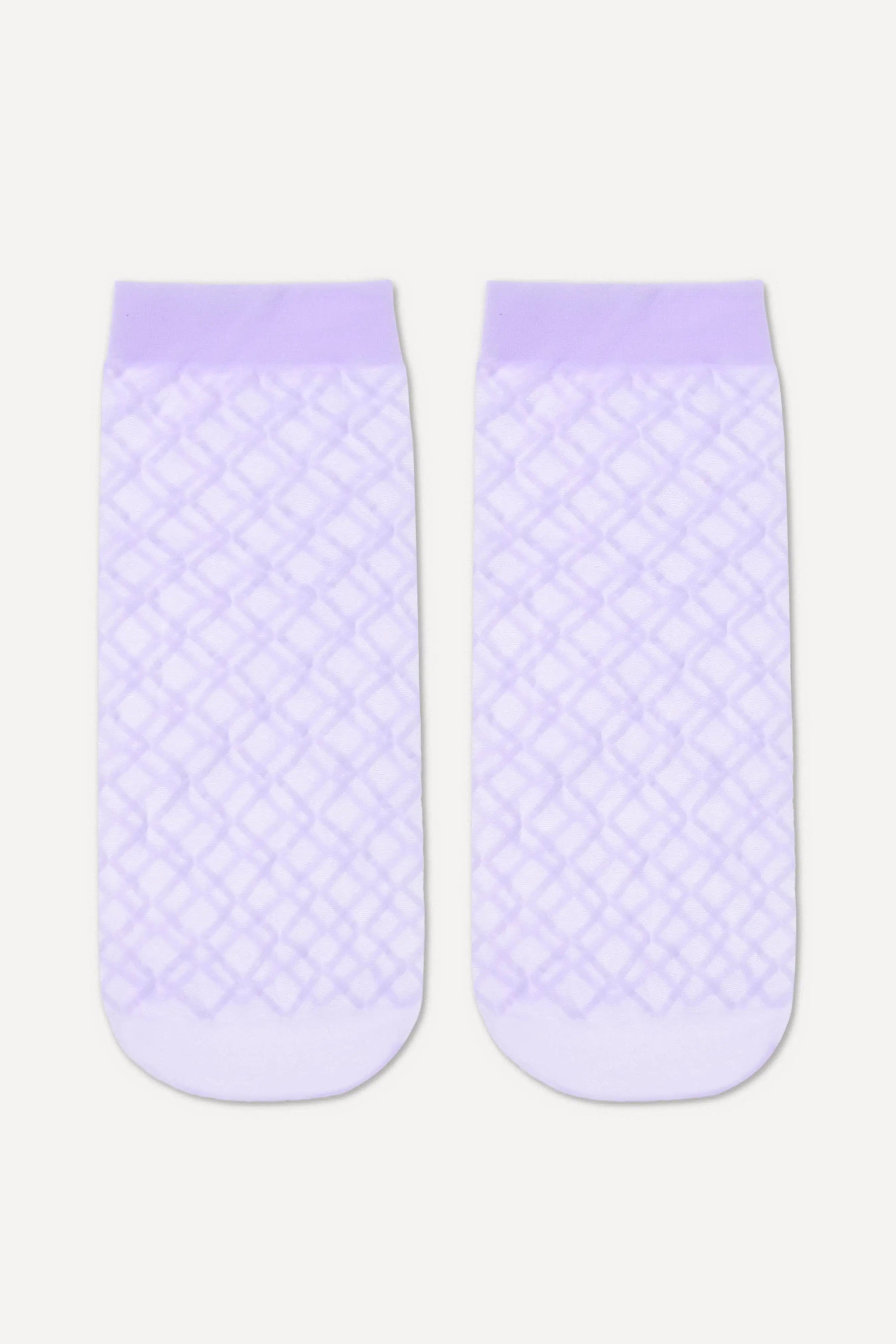 Pair of light purple socks with textured pattern on a white background #color_violet
