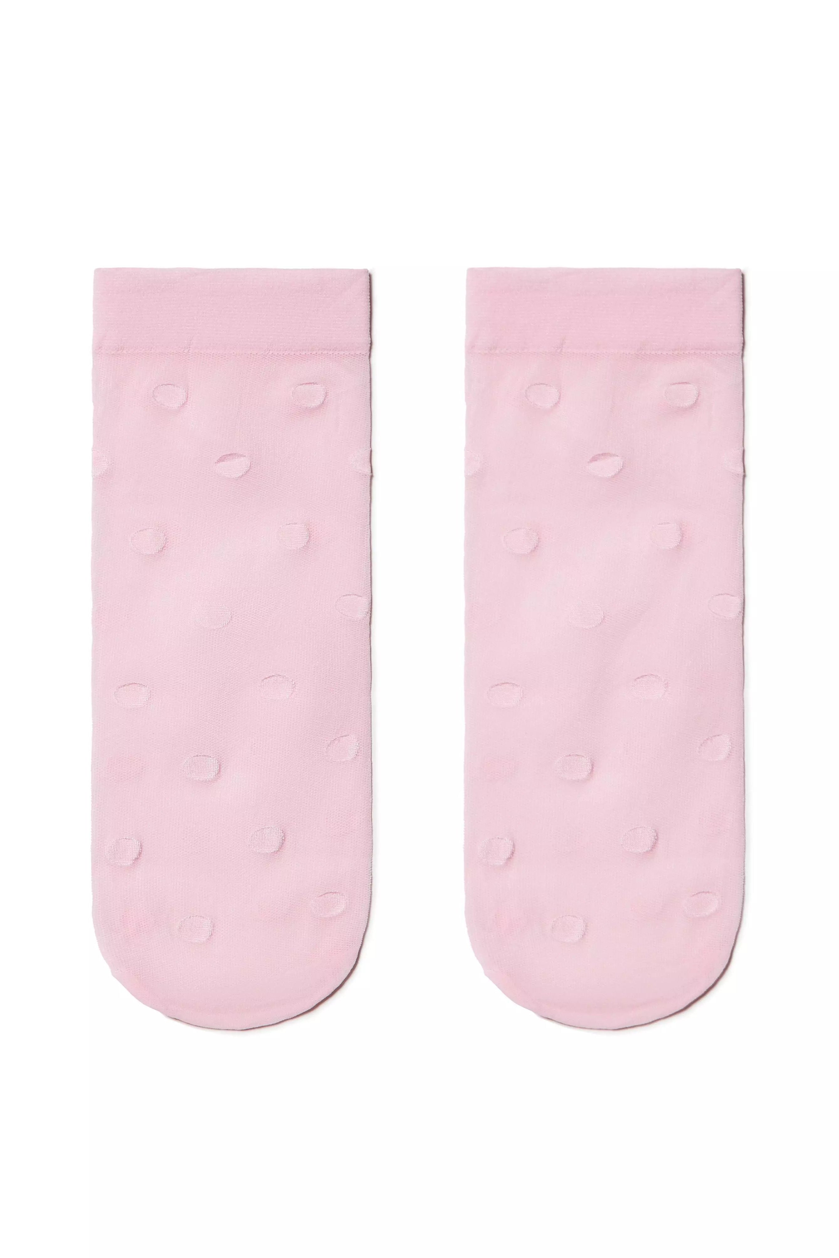 Pair of light pink socks with a subtle pattern on a white background #color_light-pink