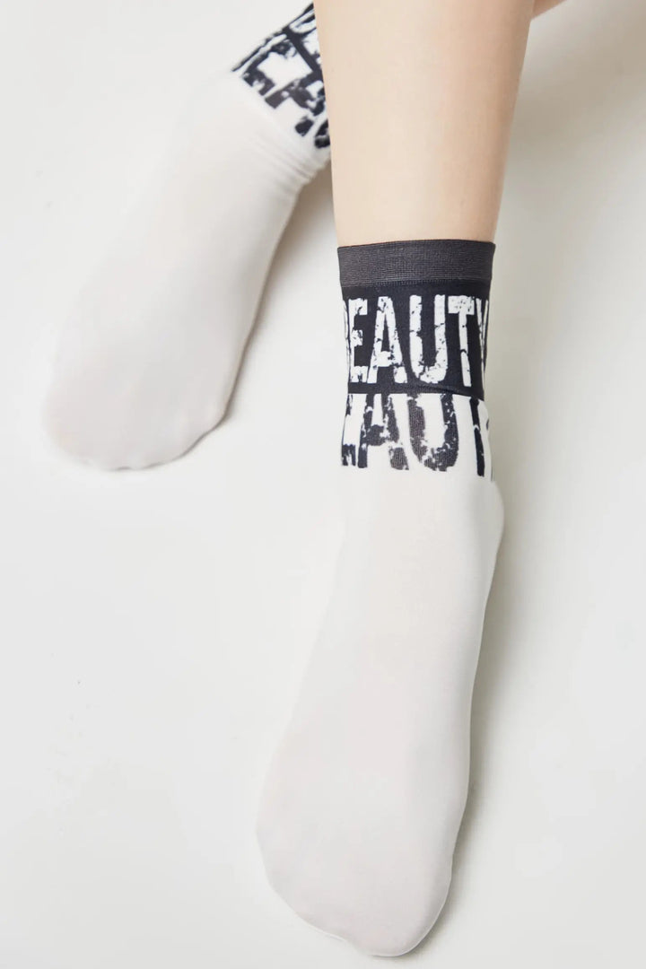 White socks with black text on a white background