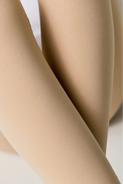 Close-up of beige tights on a white background #color_natural-nude