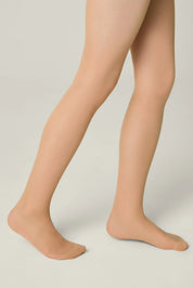Beige tights worn by a person on a plain background #color_natural-nude