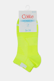 Neon green socks on a white background with a brand label. #color_lime-green