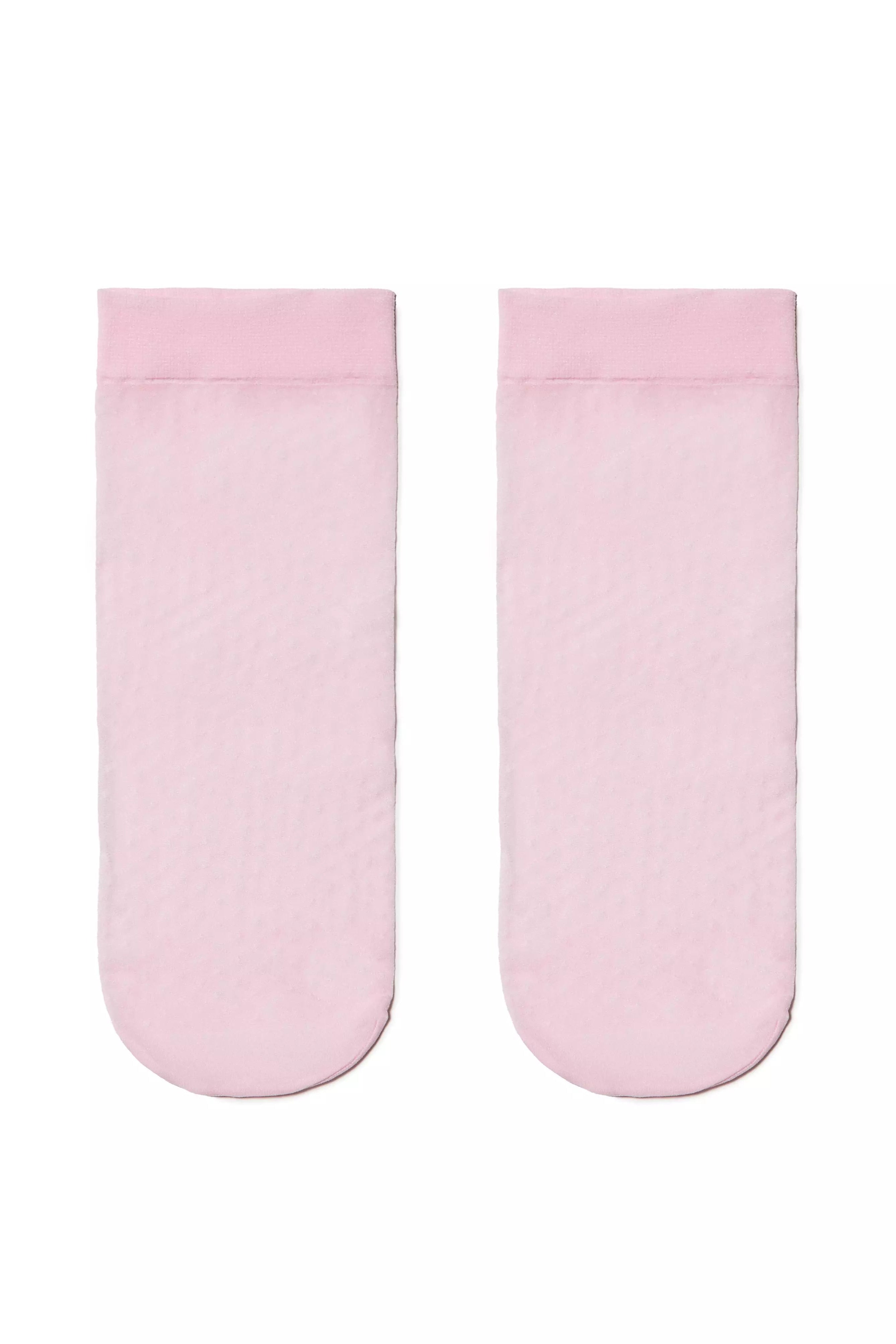Two light pink socks on a white background #color_light-pink