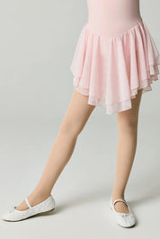 Person wearing a pink ballet outfit with a skirt on a plain background #color_natural-nude