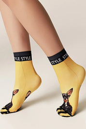 Yellow socks with dog design and 'STYLE' text on a beige background