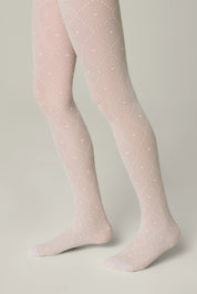 Pink tights with white polka dots worn by a person on a neutral background #color_bianco