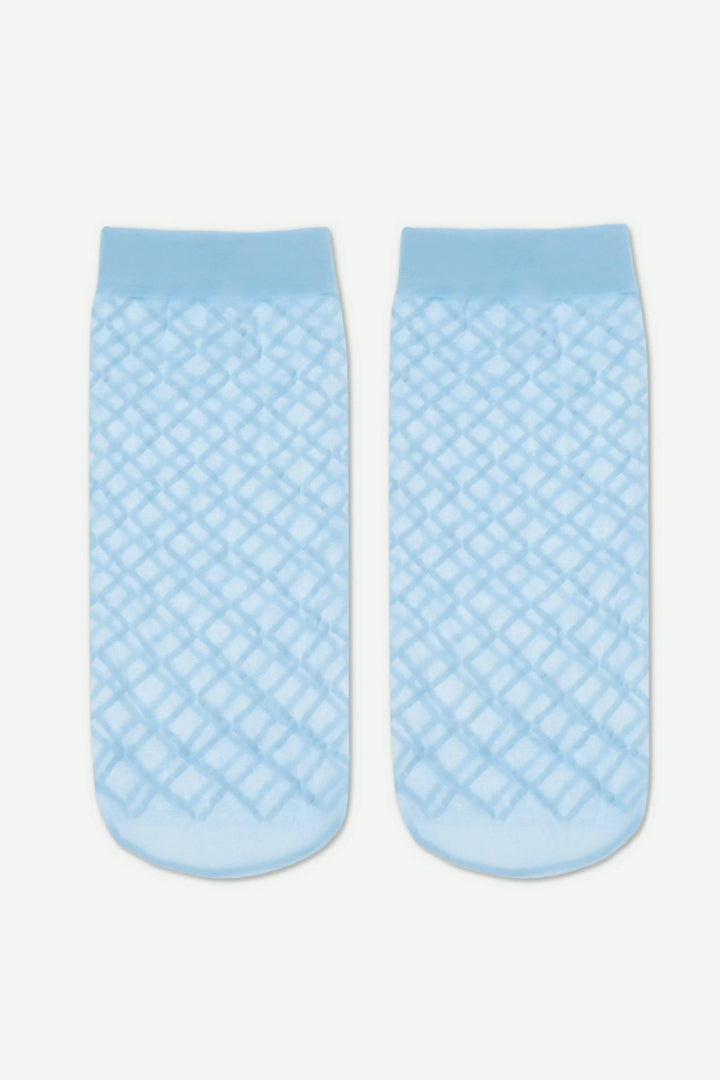 Pair of light blue textured socks on a white background #color_light-blue
