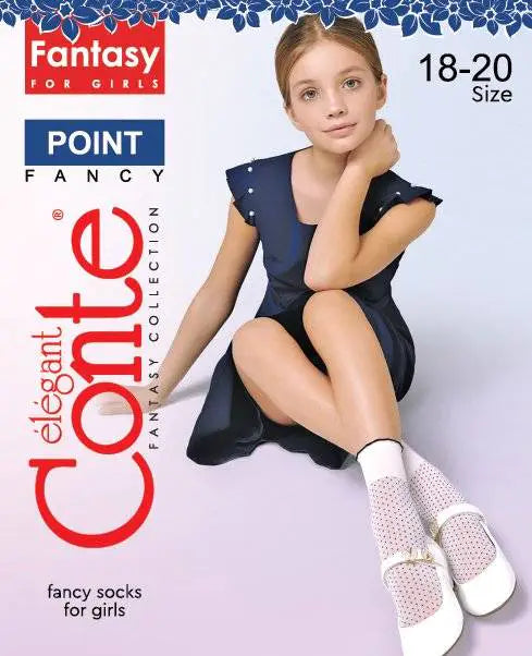 Girl wearing a navy dress with white shoes and socks, sitting on a light purple background. 'Fantasy for Girls' and 'Elegant Conte' branding visible.