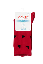 Red socks with black heart designs on a white background, featuring a CONTE label. #color_red