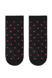 Black socks with red heart patterns on a white background #color_nero-black