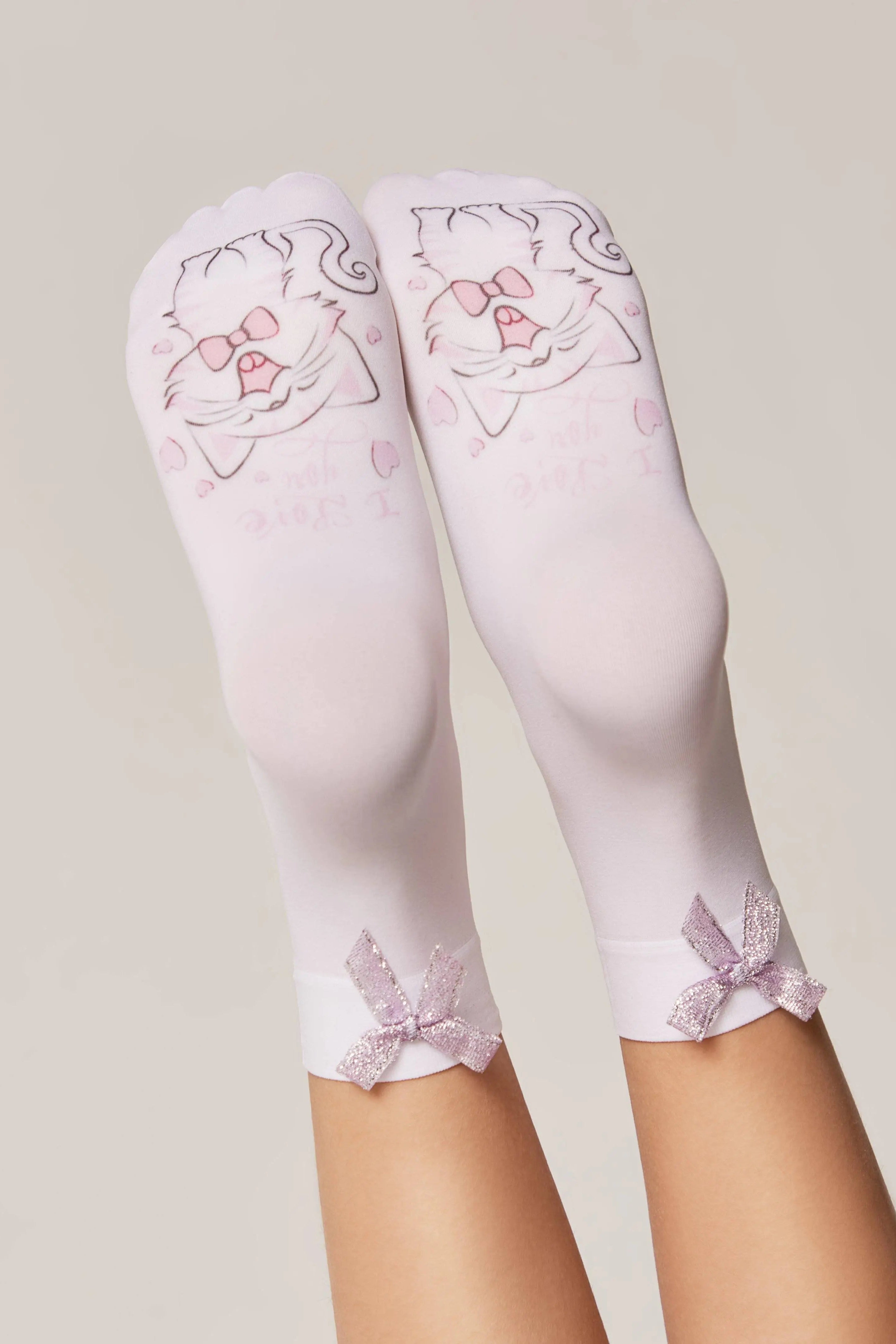 White knee-high socks with pink floral designs on a neutral background