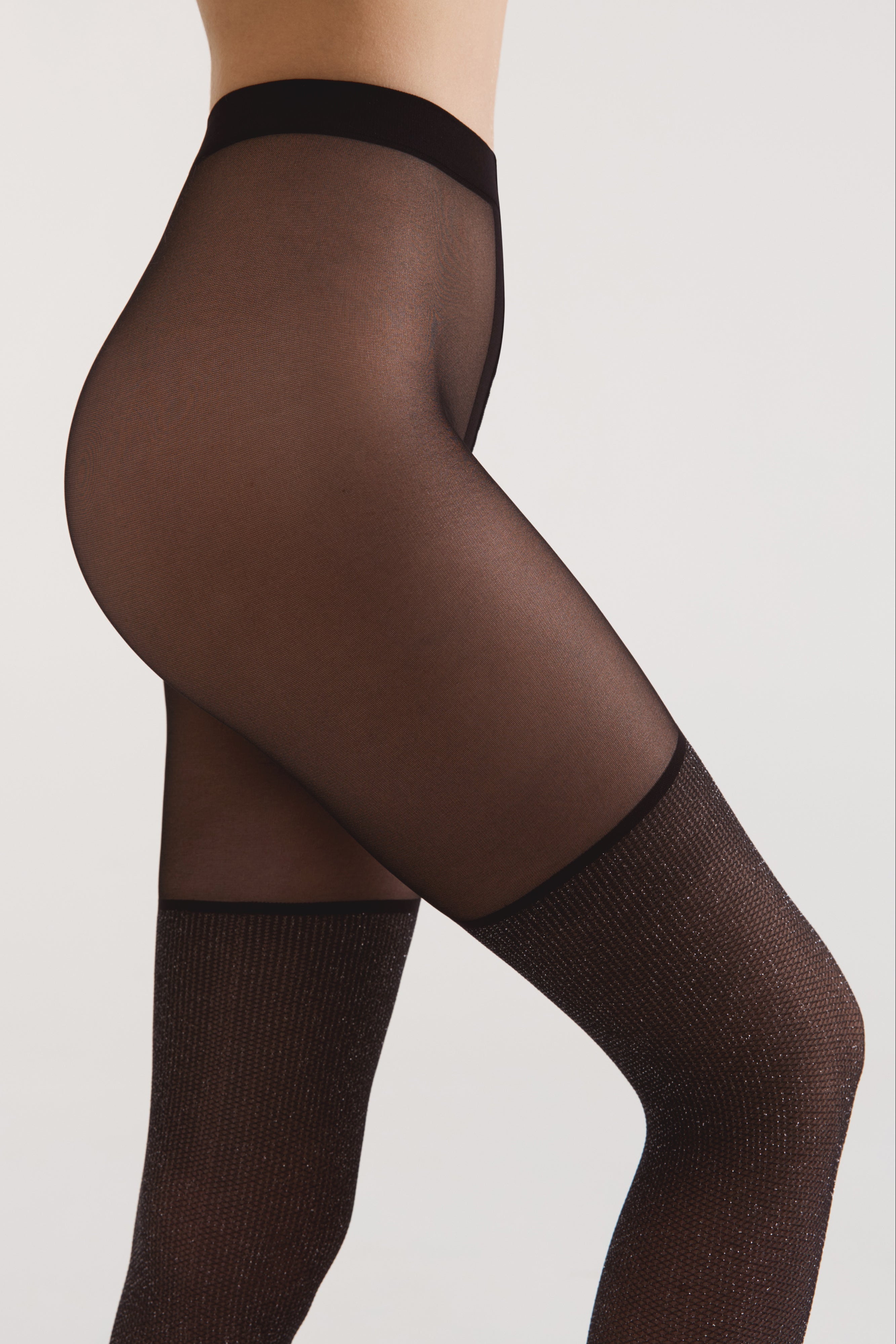 Black sheer stockings on a neutral background #color_grafit
