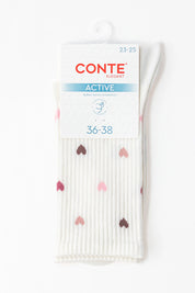 Pack of Conte socks with heart pattern on a white background #color_milky