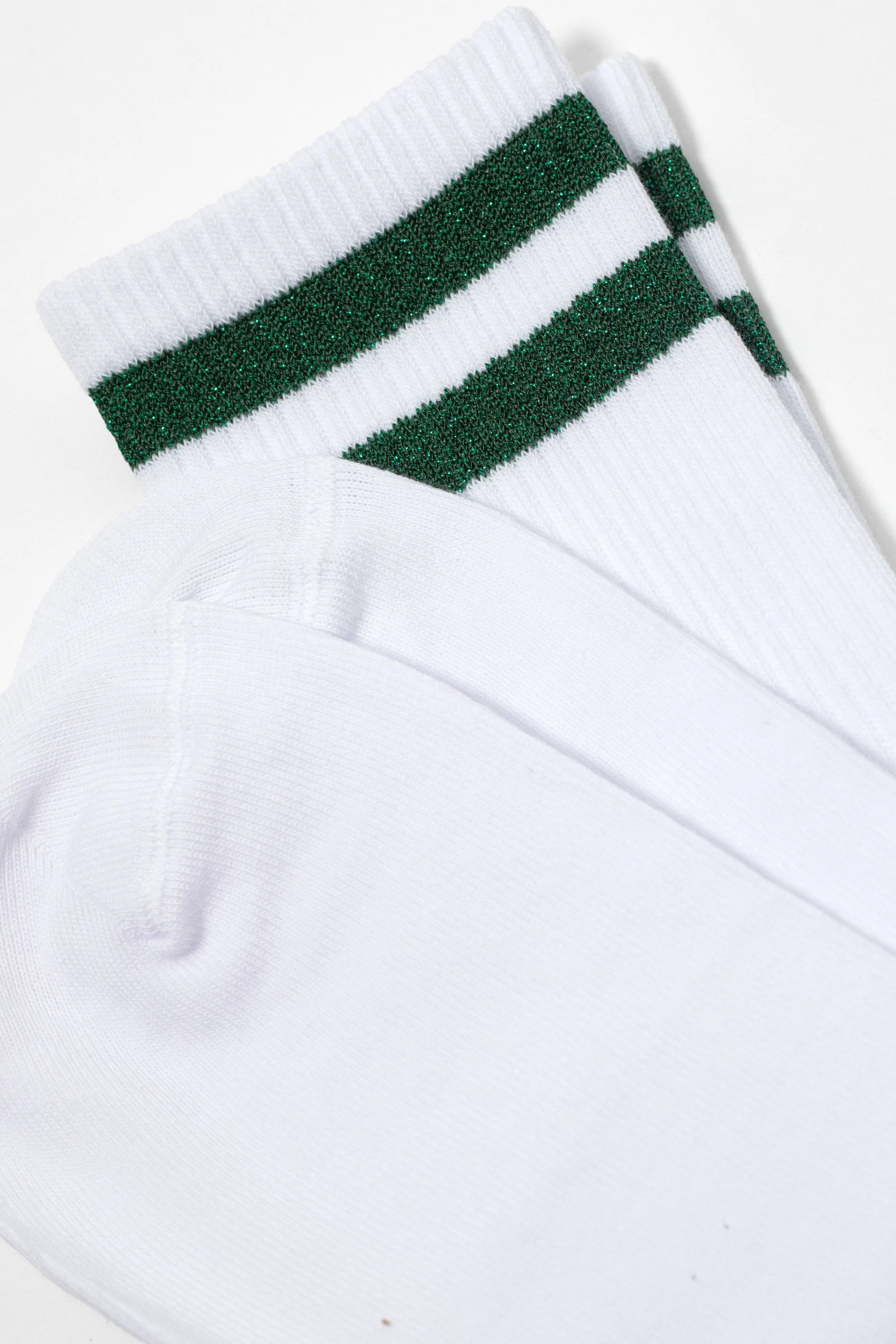 White socks with green stripes on a white background #color_green