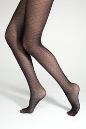 Patterned tights worn by a person on a white background #color_grafit