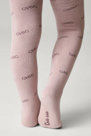 Pink tights with 'chic' text on a light gray background #color_ash-pink