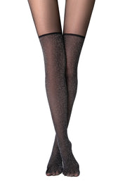 Black tights worn by a person on a white background #color_nero-black