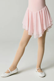 Person wearing a pink skirt on a plain background #color_natural-nude