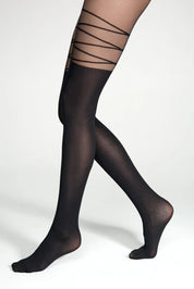 Black sheer stockings with thin straps worn by a person on a white background #color_nero-black