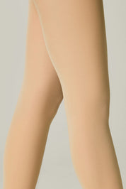 Beige tights worn by a person on a plain background #color_natural-nude
