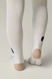 White tights with black and blue patterns on a neutral background #color_milky