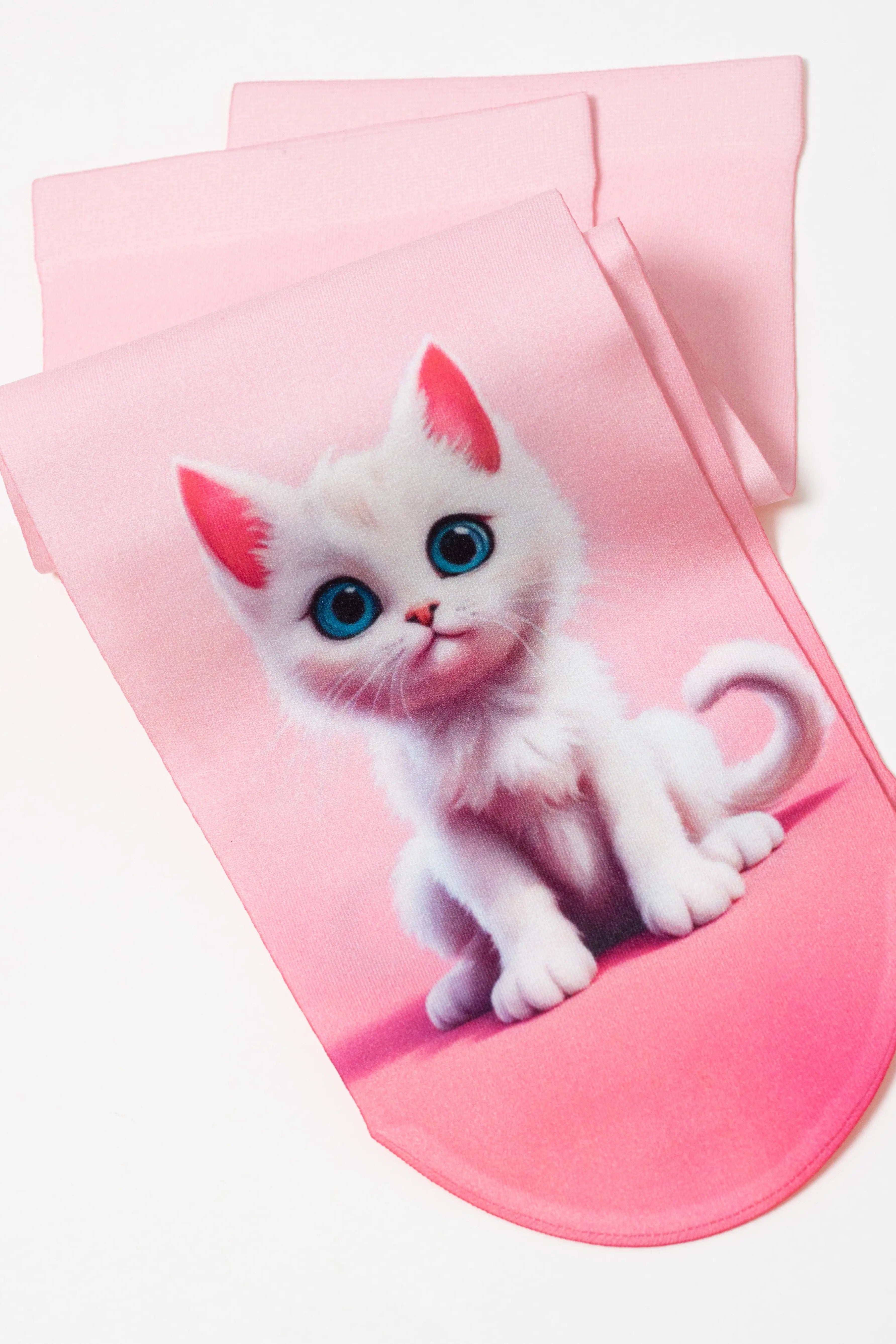Pink sock with a white cat design on a white background