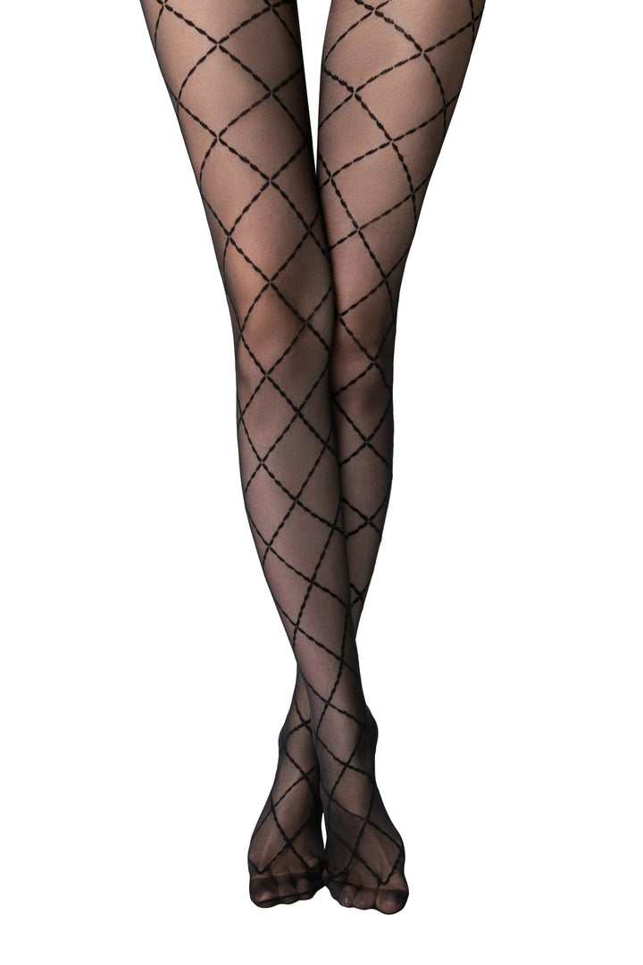 Black fishnet tights on a white background