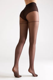 Brown tights worn by a person on a white background