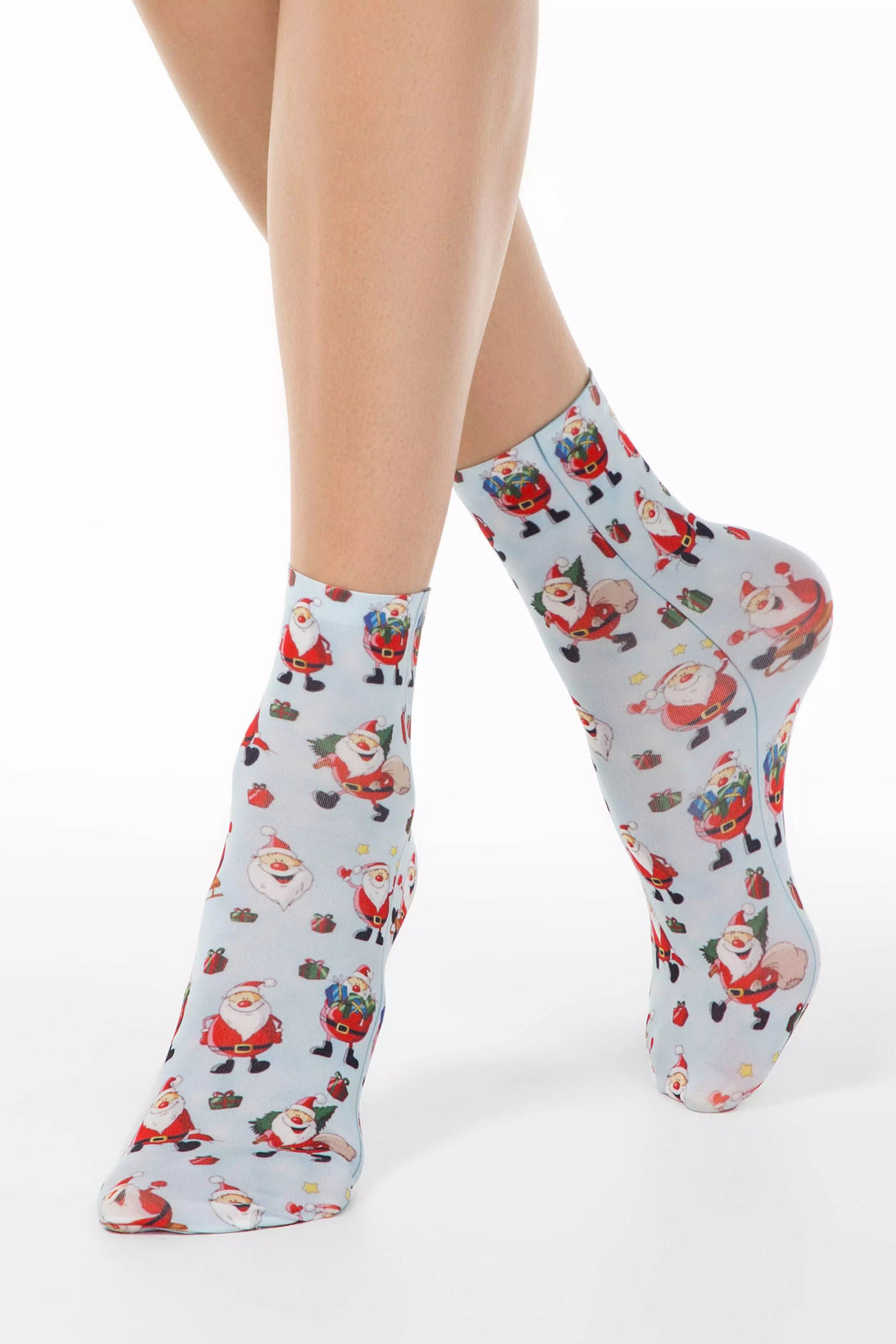Socks with Santa Claus pattern worn by a person on a white background