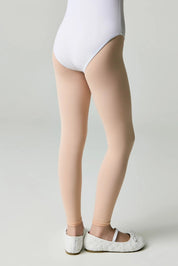 Person wearing a white bodysuit and beige tights on a plain background #color_pink-ballet