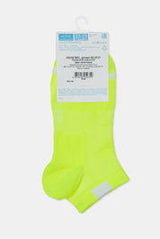 Neon green sock with a label on a white background #color_lime-green