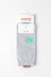A pair of light gray heathered ankle socks by Conte Active, hanging from a white cardboard hanger with size information. A small green circular sticker is visible on the front.