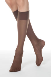 Brown tights worn by a person on a white background #color_mocca-brown